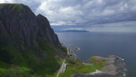 Flying-high-along-the-Norwegian-coastal-rugged-landscape-during-summer,-Aerial-forwarding-shot