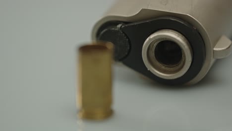 Beautiful-Macro-focus-rack-from-pistol-barrel-to-empty-shell-casing