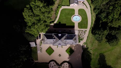 The-Limatge-castle-in-drone-topshot,-with-its-French-garden