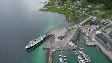 Circling-over-the-Harbor-of-Botnhamn-with-the-Ferry-inside-the-Port-and-long-line-of-vehicles