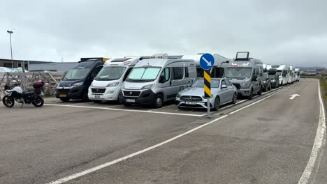 Cars-and-campers-waiting-to-board-the-ferry-in-the-morning-at-Andenes-port