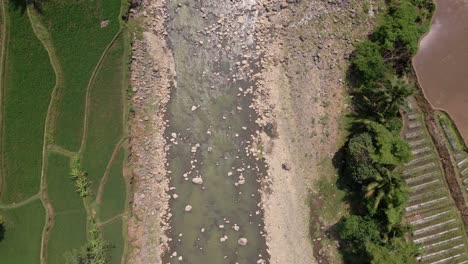 Almost-dried-up-river-during-droughts-in-Indonesia,-aerial-view