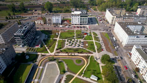 Aerial-backward---center-of-Gdynia-over-the-central-park