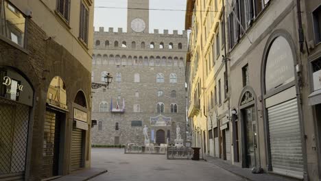Walking-towards-the-famous-and-monumental-florentine-square-"Piazza-della-Signoria