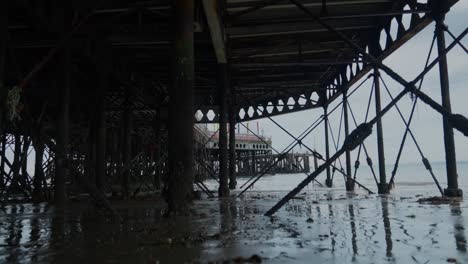 Wide-shot-of-the-structure-underneath-a-seaside-pier