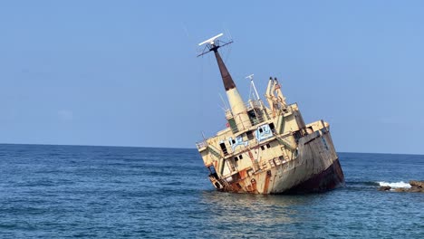 Abandoned-Edro-III-Shipwreck-at-seashore-of-Peyia,-near-Paphos,-Cyprus