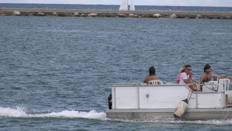 pontoon-boat-cruising-through-water