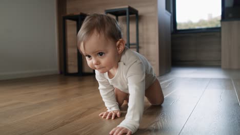 Video-of-little-girl-crawling-at-home-interior.