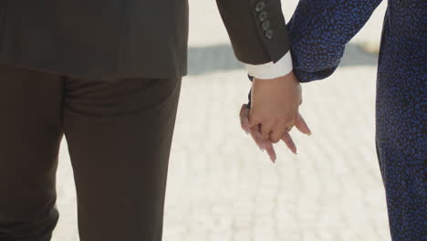 Close-up-shot-of-hands-of-Muslim-couple