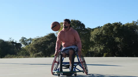 Happy-basketball-player-in-sports-wheelchair-throwing-ball