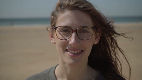 Closeup-shot-of-smiling-young-woman-in-eyeglasses.