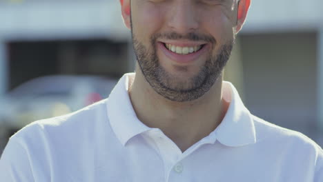 Cropped-shot-of-smiling-male-face.