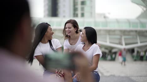 Smiling-young-women-posing-for-photograph