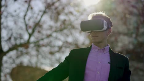 Young-man-using-VR-headset-outdoor