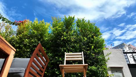 Static-shot-of-a-garden-chair-on-a-terrace,-from-bellow