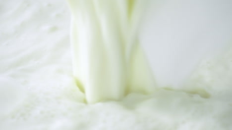 detail-shot-of-pouring-milk