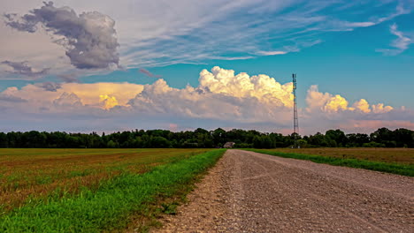 Cinematic-time-lapse-footage-of-dramatic-cloud-formations-with-a-agricultural-field-in-the-foreground