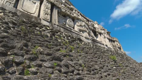 Pan-across-the-stone-work-of-the-Xunantunich-Mayan-Ruins-in-San-Jose-Succotz,-Belize