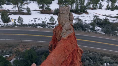 Aerial-Drone-View-Red-Granite-Rock-Formations-At-The-Highway-In-Bryce-Canyon-National-Park,-Utah-USA