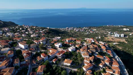 Ionian-Sea's-Vast-Azure-Expanse-Seen-from-the-Picturesque-Mediterranean-Village-of-Dhermi---Mountain-Stone-Houses-and-Tourism-in-Albania