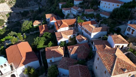 Mediterranean-Village-of-Dhermi:-Stone-Houses,-Red-Roofs,-White-Church,-and-Narrow-Alleys---a-Tourist's-Delight-in-Albania