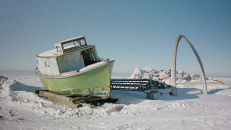 Winterized-boat-on-snowy-beach-at-Utqiagvik-Barrow-Alaska-North-Slope-in-the-Arctic