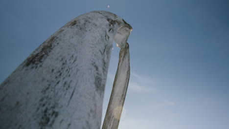 Tilt-up-from-winterized-boat-to-Whale-Bones-arch-at-Utqiagvik-Barrow-Alaska-North-Slope-in-the-Arctic