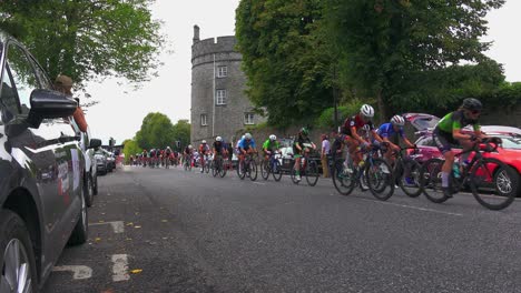 Women's-Cycle-Race-passing-Kilkenny-Castle-ireland-on-a-warm-Autumn-day