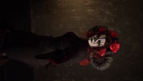 Catrina-Cosplay-girl-moving-slowly-hypnotizing-and-luring-you-to-come-with-a-black-background,-Medium-shot