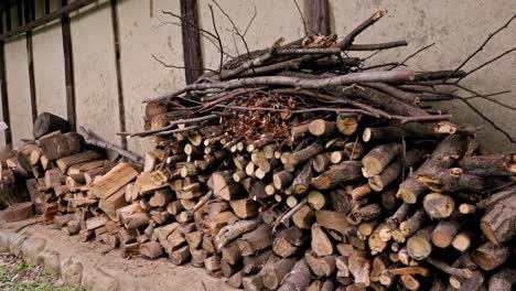 stacked-firewood-in-a-backyard-of-old-Japanese-house