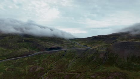 Aerial-View-Of-Mountain-Road-In-Borgarfjordur,-East-Iceland---drone-shot