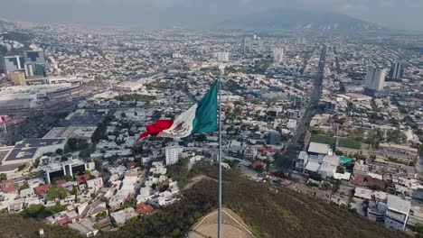 Mexican-flag-in-a-windy-day-in-a-north-mexican-city-turning-around