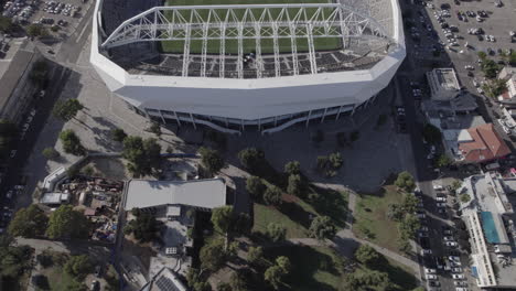Raw-file---Tilt-up-Revealing-tel-aviv-Bloomfield-football-Stadium-from-a-drone,-the-Stadium-hosted-musical-acts-from-time-to-time-and-It-is-the-home-of-three-soccer-clubs