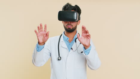 Excited-doctor-in-VR-goggles-man-using-headset-helmet-app,-watching-virtual-reality-3D-360-video