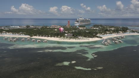 Aerial-retreats-from-tiny-Coco-Cay,-Bahamas-stop-for-cruise-ships