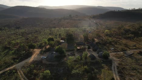 aerial-view-village-in-Chapada-dos-Veadeiros-"Aldeia-Macaco"-hollow-shaped-bioconstruction-houses-cerrado-beauty-landscape-Goiás-Brazil