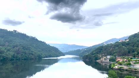 Douro-River-reflecting-the-beautiful-and-calm-green-waters-under-the-sky
