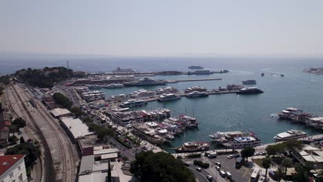 Aerial---Split,-Croatia:-Bustling-harbor,-docked-boats,-vibrant-cityscape