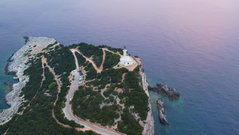 Aerial-Overhead-View-Of-Doukáto-Lighthouse-On-Lefkada-Island-Surrounded-By-Calm-Sea-Waters