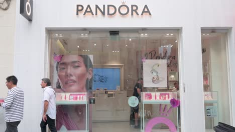 Shoppers-and-pedestrians-are-seen-at-the-Danish-jewelry-manufacturer-and-retailer,-Pandora-store