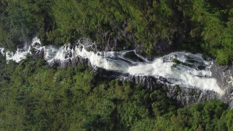 Colnett-Waterfall-near-Hienghene-New-Caledonia,-vertical-aerial-video
