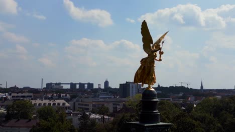 Lovely-aerial-top-view-flight-Gold-Angel-of-Peace-column-City-town-Munich-Germany-Bavarian,-summer-sunny-cloudy-sky-day-23