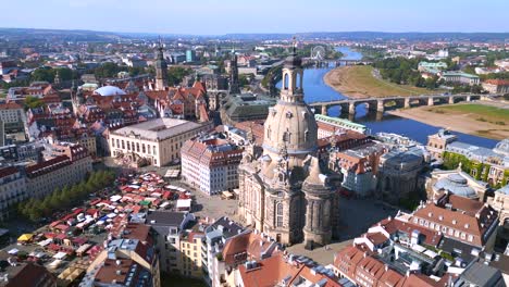Dramatic-aerial-top-view-flight-Dresden-city-Women-church-Frauenkirche-City-town-Germany,-summer-sunny-blue-sky-day-23