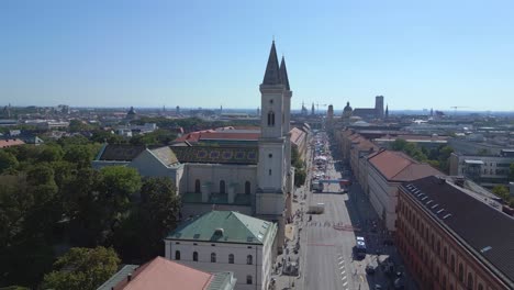 Magic-aerial-top-view-flight-Church-St-Ludwig-City-town-Munich-Germany-Bavarian,-summer-sunny-blue-sky-day-23