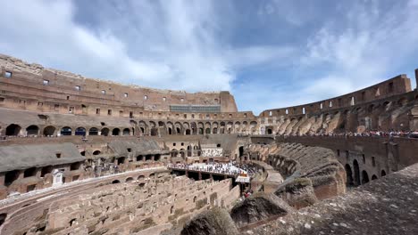 From-inside-the-Colosseum,-the-camera-gazes-out-over-the-remnants-of-the-ancient-stage