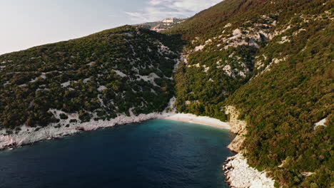 Aerial-orbit-establishing-blue-lagoon-beach-on-Cres-Island-Croatia