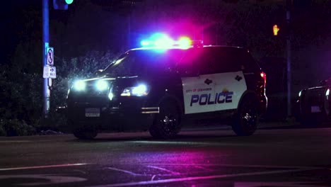The-Oceanside-Police-Department-car-at-night-with-siren-on