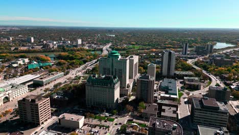 Cinematic-Orbit-Daytime-Landscape-Drone-Footage-of-The-Fort-Garry-Hotel-Historic-Landmark-in-Downtown-Urban-Canadian-City-Spinning-Restaurant-Tourist-Attraction-Winnipeg-Manitoba-Canada