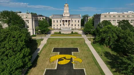 The-University-of-Iowa-Hawkeyes-painting-on-grass-lawn-of-Old-Capitol-building-of-Iowa