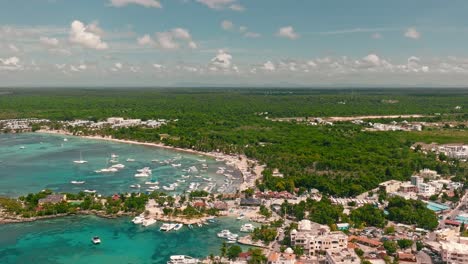 Birdseye-view-of-Bayahibe-tourist-port-and-surrounding-landscape,-La-Romana-in-Dominican-Republic